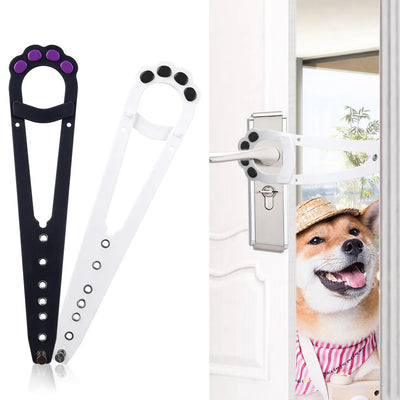 Aviour adjustable cat door latch in black and white with paw designs shown installed on a door with a dog nearby