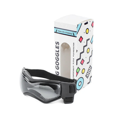 Aviour adjustable pet goggles with black frame and clear lenses next to colorful patterned packaging