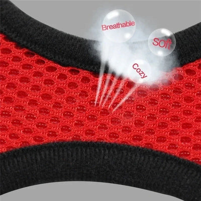 Close-up of breathable soft red mesh fabric with black trim on adjustable pet harness for cats and dogs