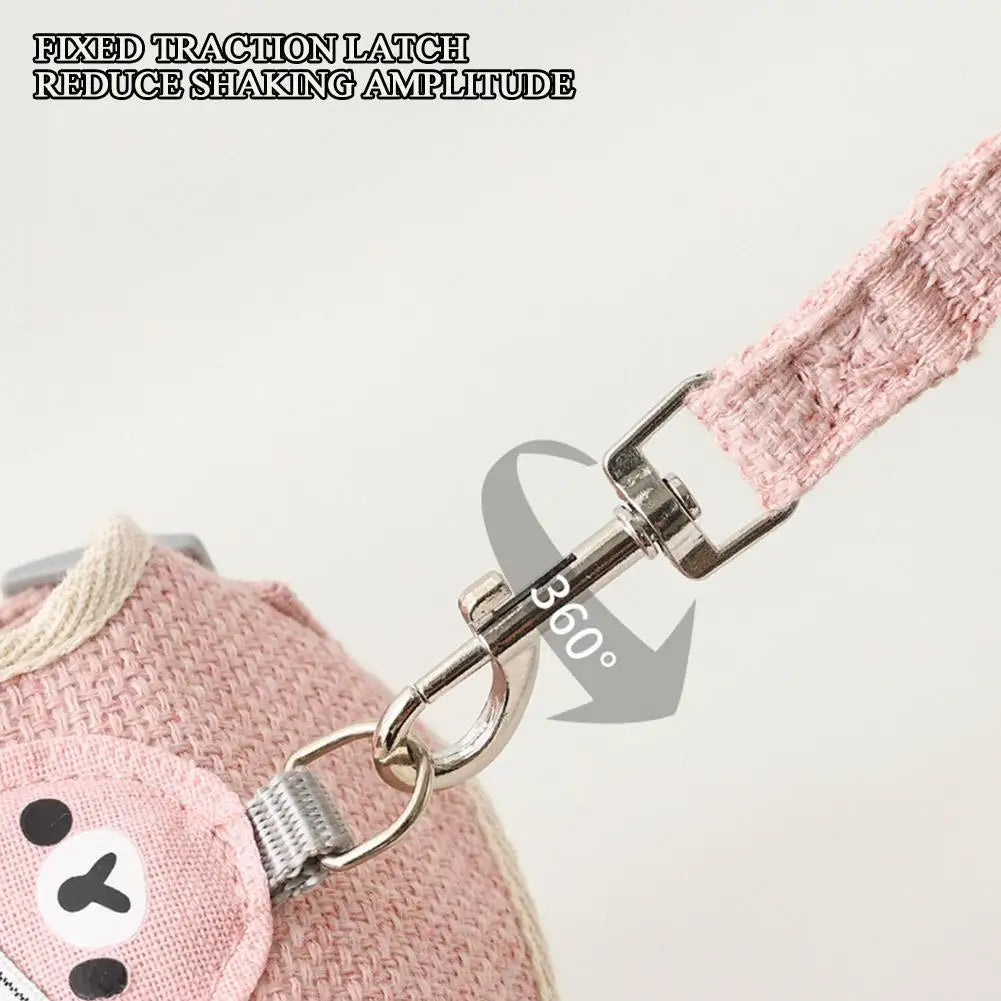 Close-up of pink adjustable undershirt harness for pets with fixed traction latch and metal clasp