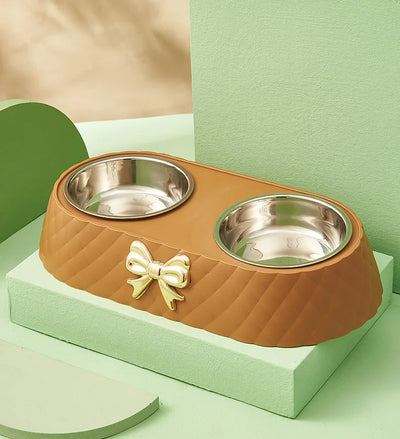 Aviour double stainless steel pet bowl with quilted brown base and decorative gold bow