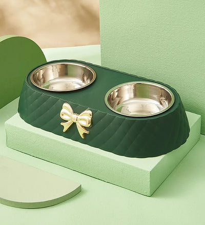 Aviour double stainless steel pet bowl with quilted green base and decorative gold bow