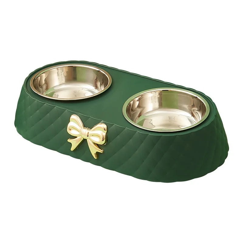 Aviour double stainless steel pet bowl with green quilted base and gold bow decoration