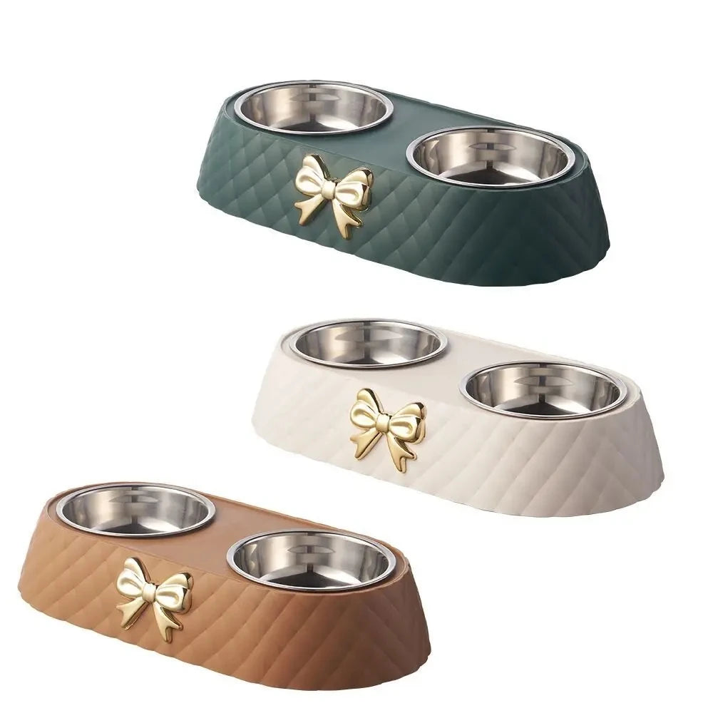 Aviour double stainless steel pet bowl with quilted base and gold bow detail in green white and brown colors