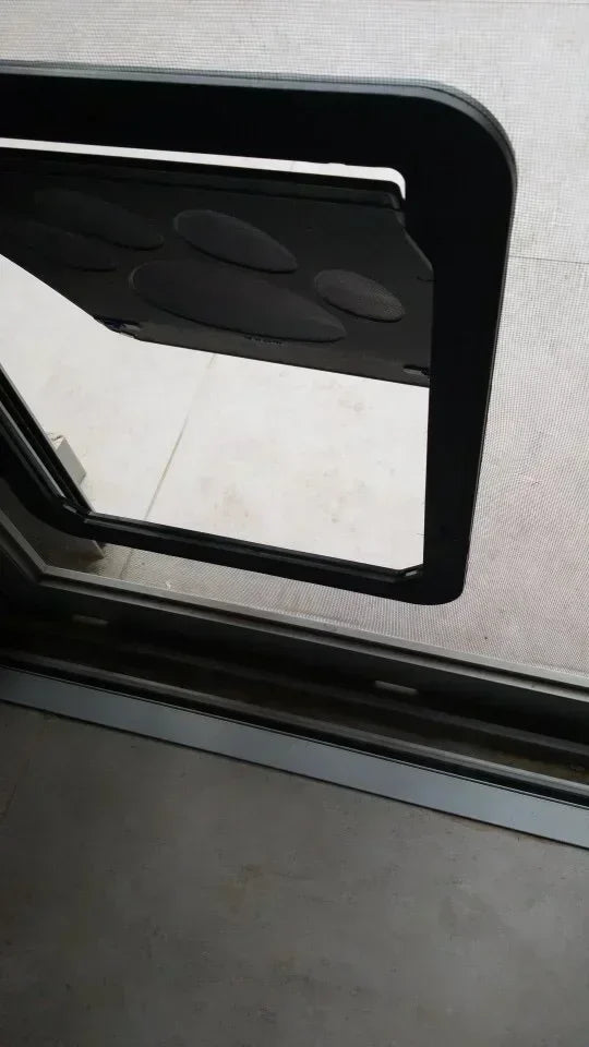 Aviour lockable pet door for windows with black frame and secure locking mechanism