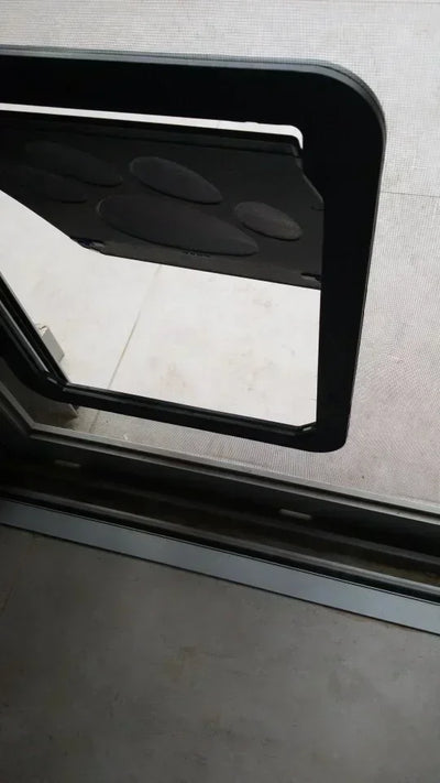 Aviour lockable pet door for windows with black frame and secure locking mechanism