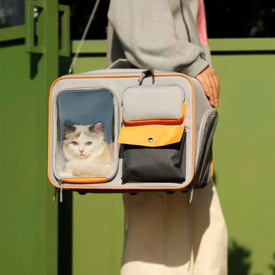 Aviour portable cat carrier on wheels with transparent window and storage pockets carried by person