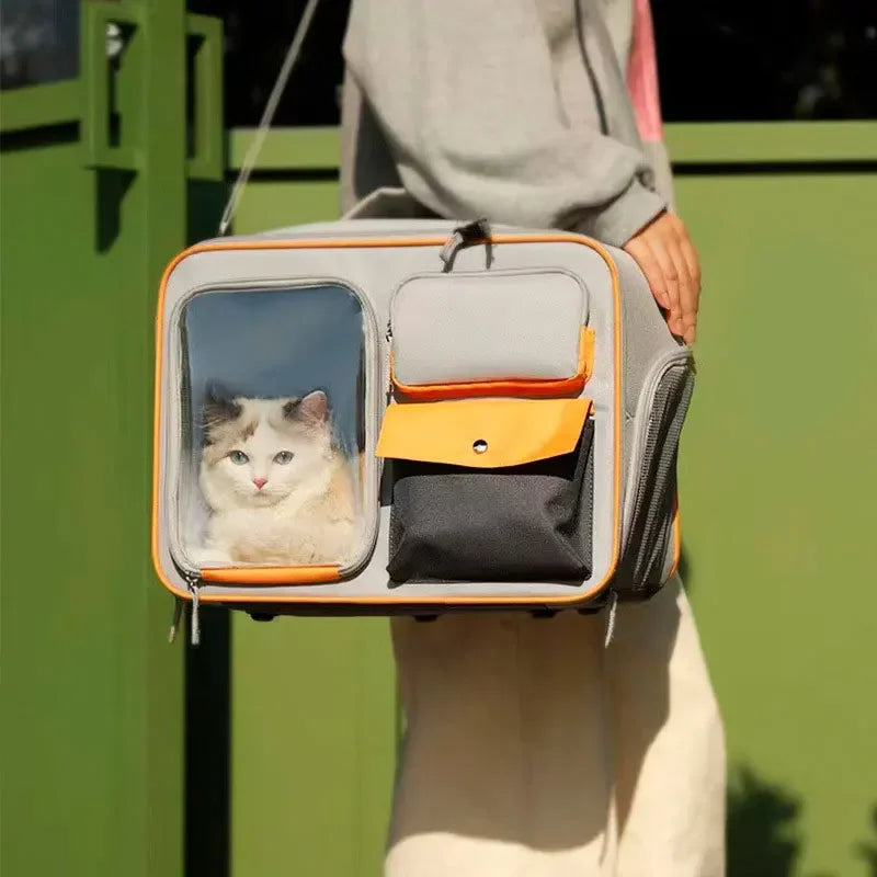 Aviour portable cat carrier on wheels with transparent window and multiple pockets carried by person