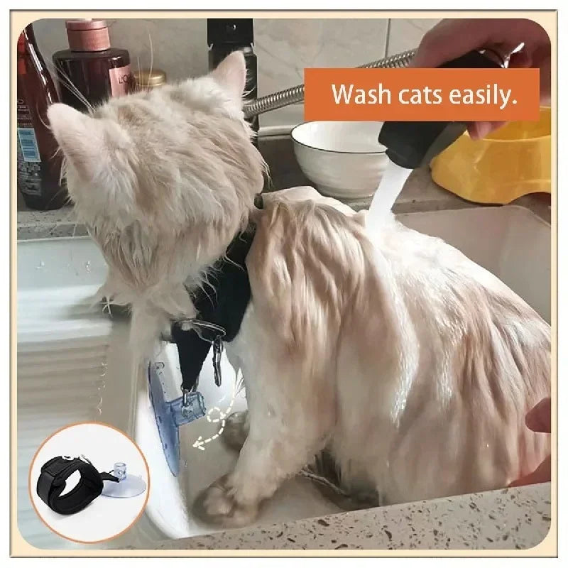 Cat wearing Aviour pet shower restraint collar while being washed in a sink with water spray