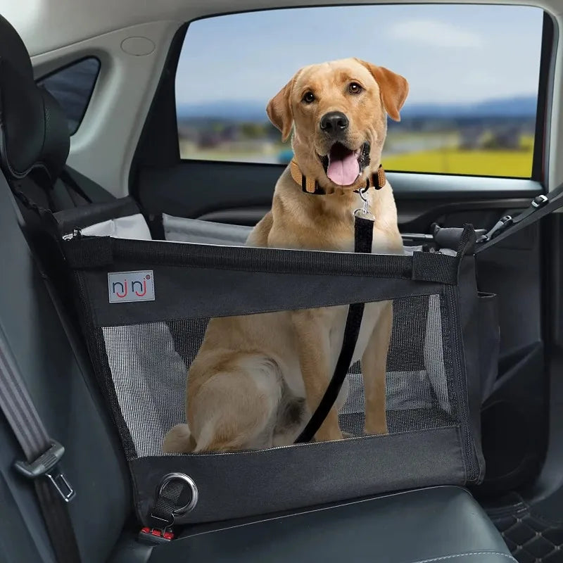 Aviour safe pet seat for car travel with a happy dog securely seated inside the black mesh carrier