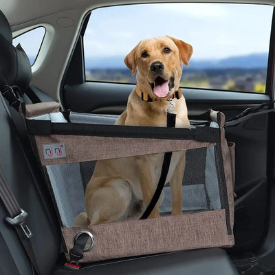 Aviour safe pet seat for car travel with brown mesh sides holding a happy golden retriever inside